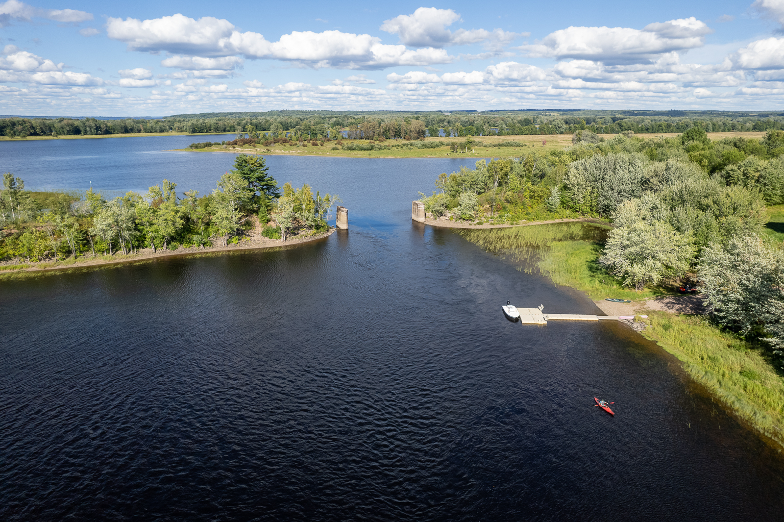 Old train bridge abutments where Harts Lake flows into and out of the Wolastoq (St. John) River